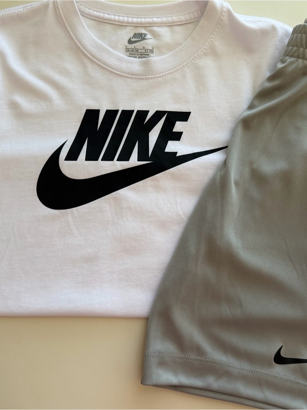 Nike White Tee with Black Logo and Gray Shorts